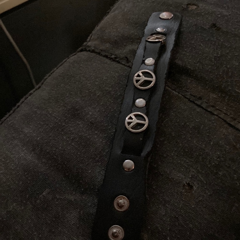Black leather peace bracelet